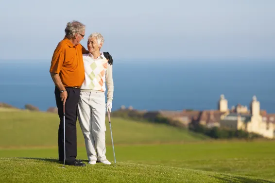 Couple golfing in Woolacombe
