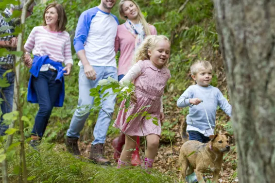 Family out for a walk in the countryside whilst on holiday
