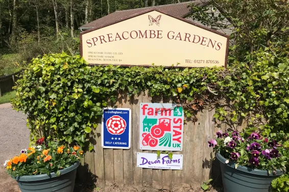 The entrance sign for Spreacombe Holiday Cottages
