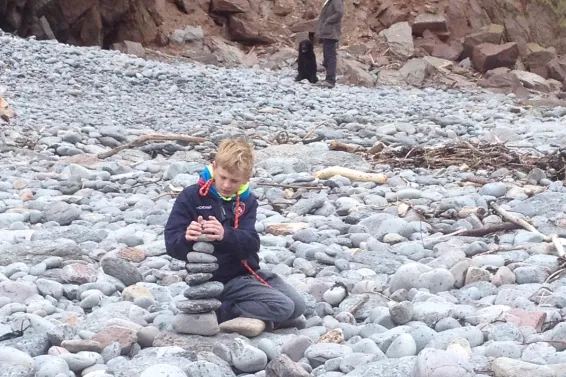 Making stone sculptures at Heddons Mouth, Exmoor