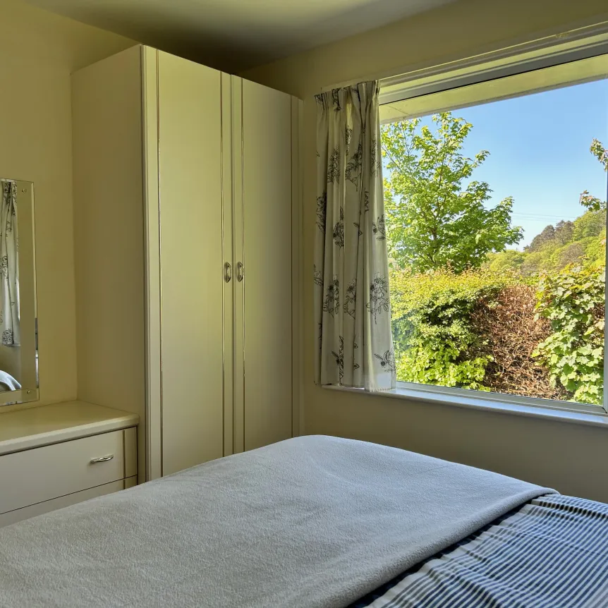 Fuchsia double room showing wardrobe 