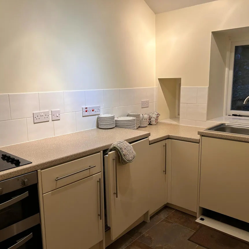 The kitchen space inside The Barn at Spreacombe Holiday Cottages