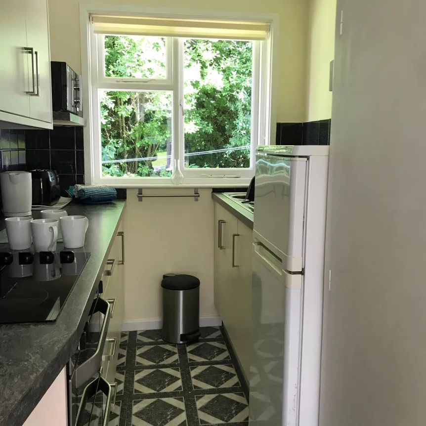 The kitchen space inside Camellia Cottage at Spreacombe Holiday Cottages