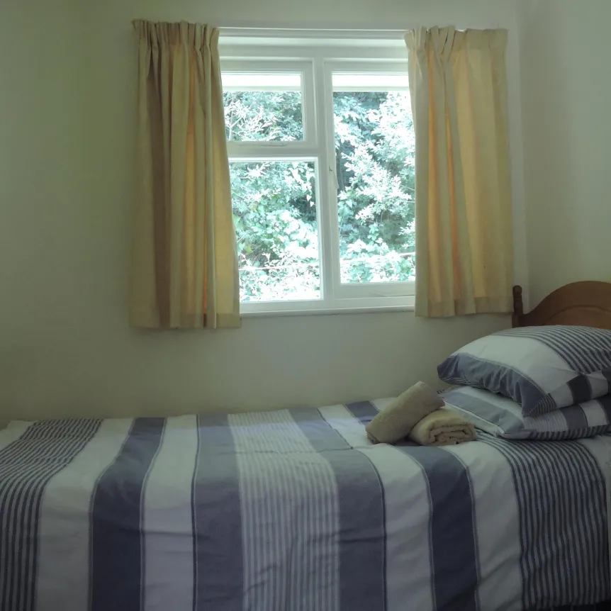 The single bedroom inside Clematis Cottage at Spreacombe Hoiday Cottages
