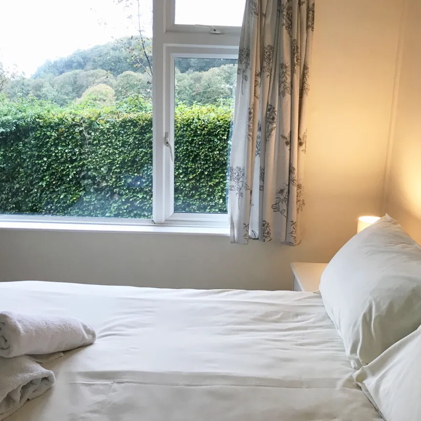 The double bedroom inside Fuchsia Cottage at Spreacombe Holiday Cottages