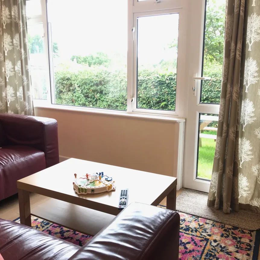 The lounge inside Fuchsia Cottage at Spreacombe Holiday Cottages
