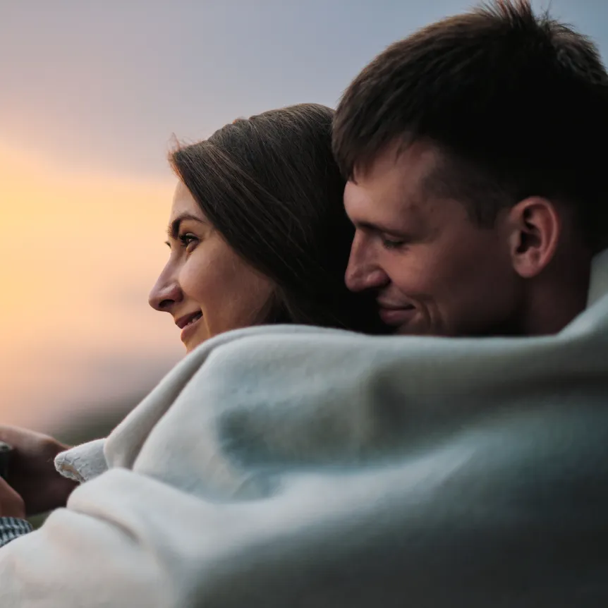 Couple relaxing enjoying a sunset