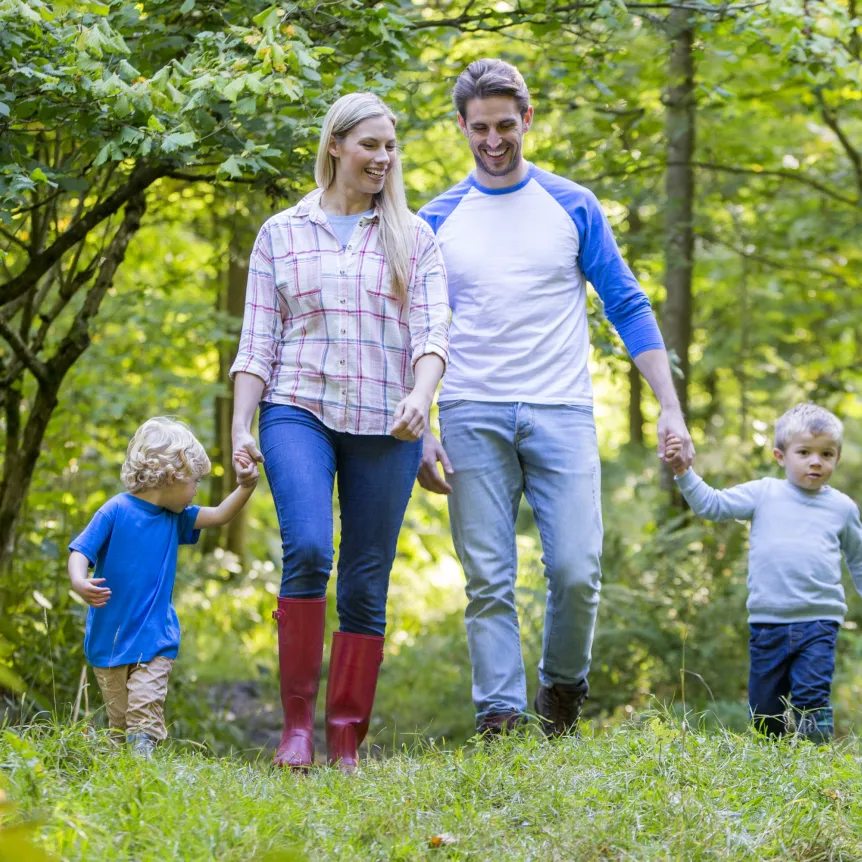 Family out for a walk in the countryside whilst on holiday