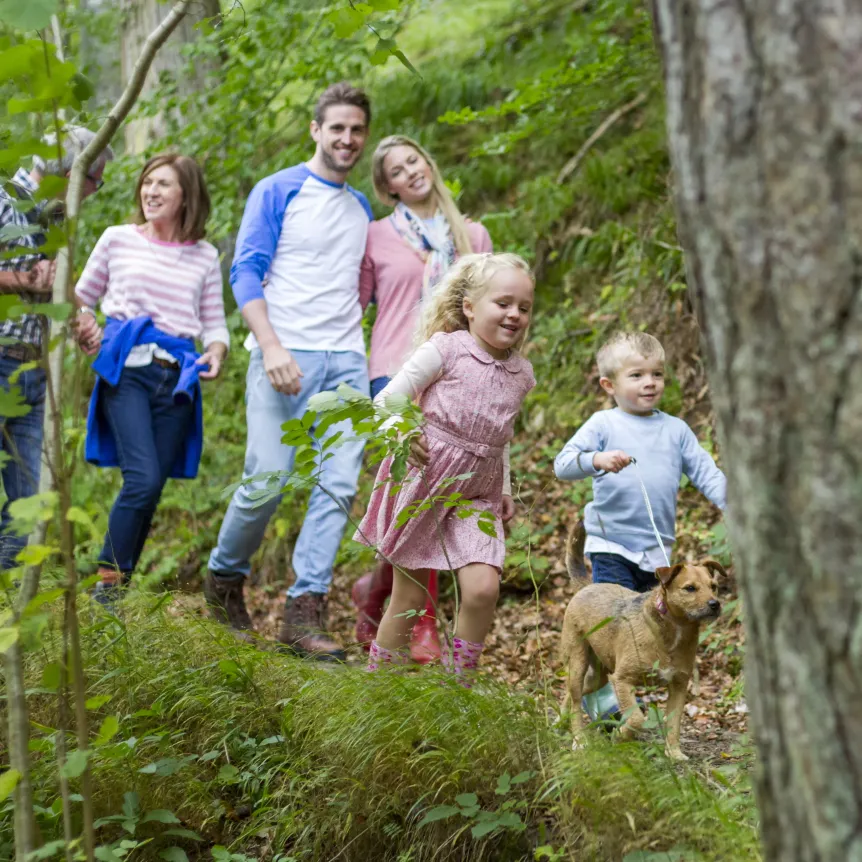 Family out for a walk in the countryside whilst on holiday