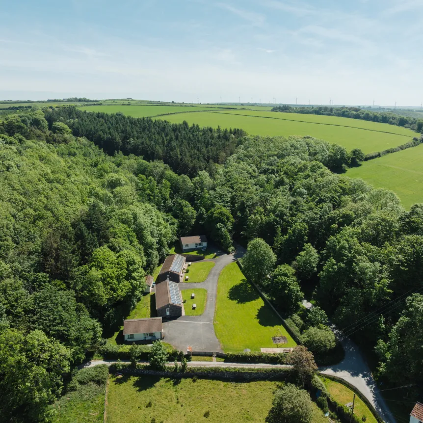 Aerial photographs of Spreacombe Gardens showing the properties in the woodland 