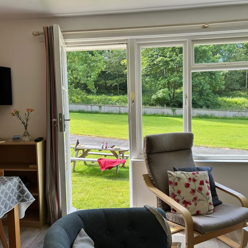 Hibiscus Cottage lounge looking outside 