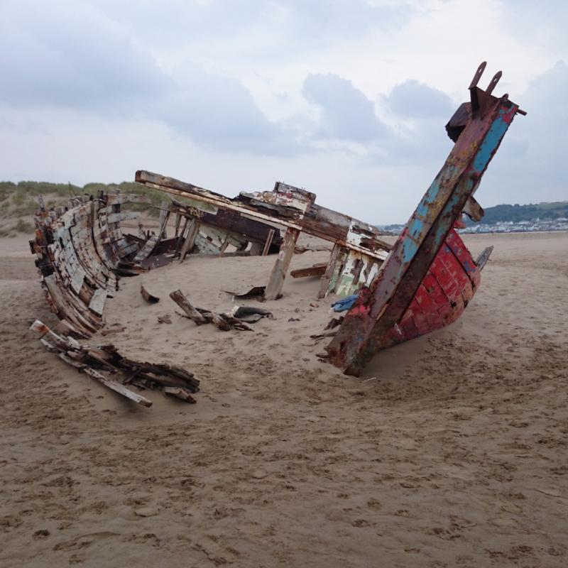 This boat has been steadily decaying over the years that we have walked around Crow Point. To my mind it still has a beauty to it.