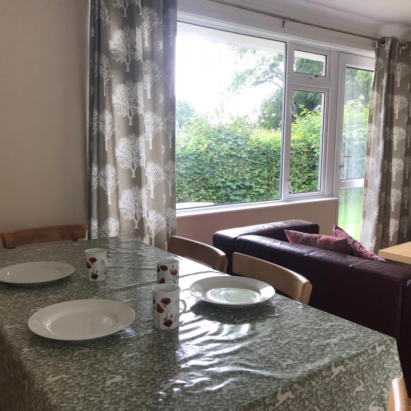 Dining table in Fuschia , Spreacombe Gardens