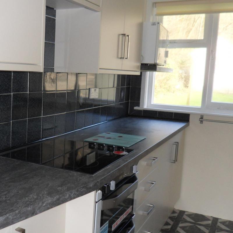 Kitchen for self catering cottage. Spreacombe gardens. Shows the new cooker and units