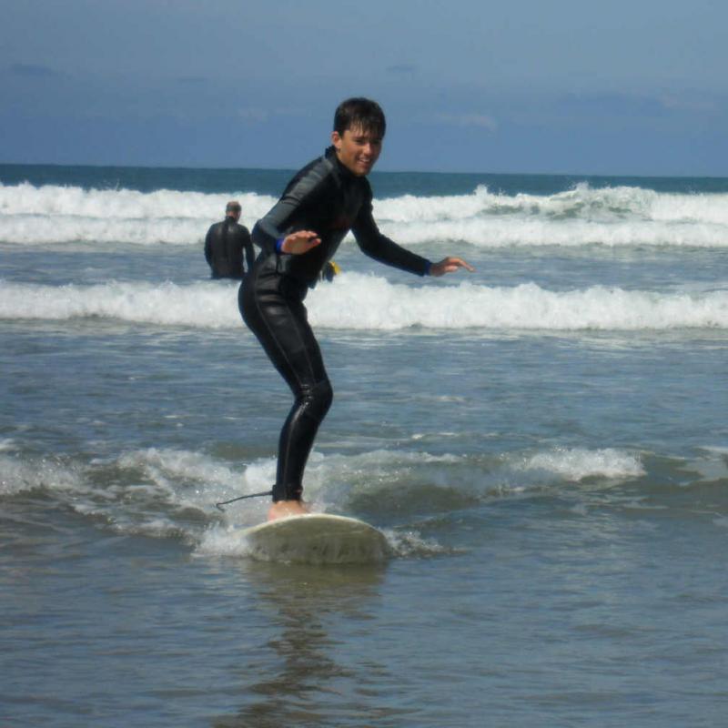 Teenager surfing at Saunton Beach